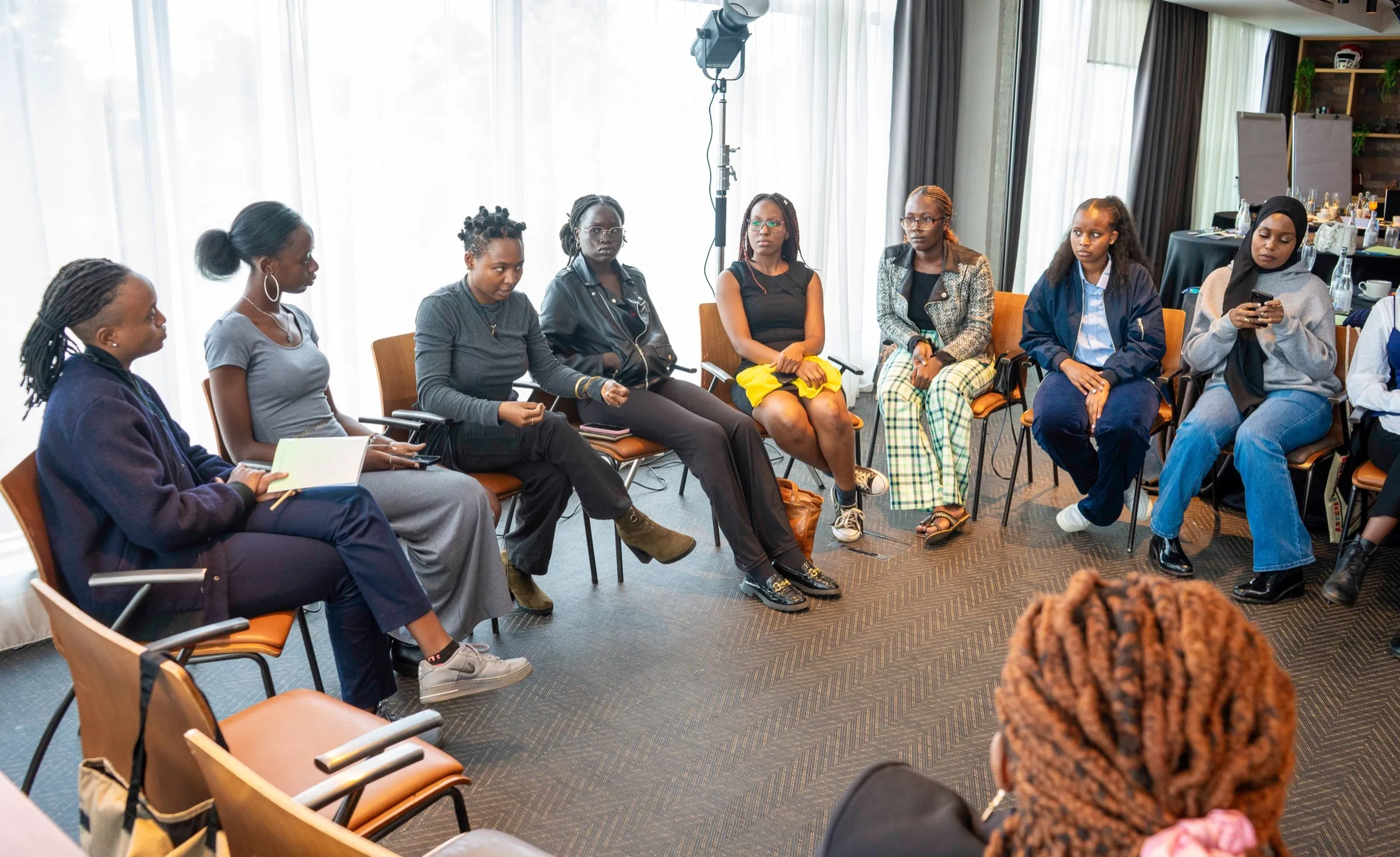 TWSS members in a circle conversation in Nairobi