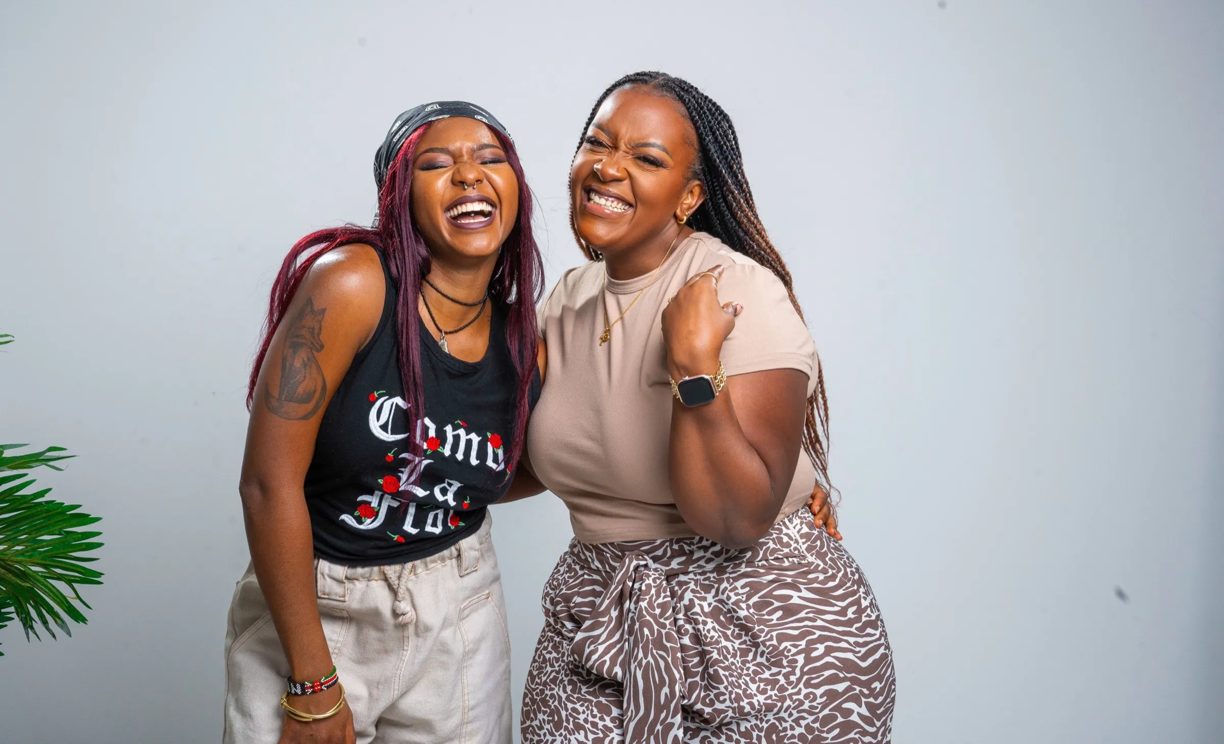 Two TWSS women laughing together in Nairobi