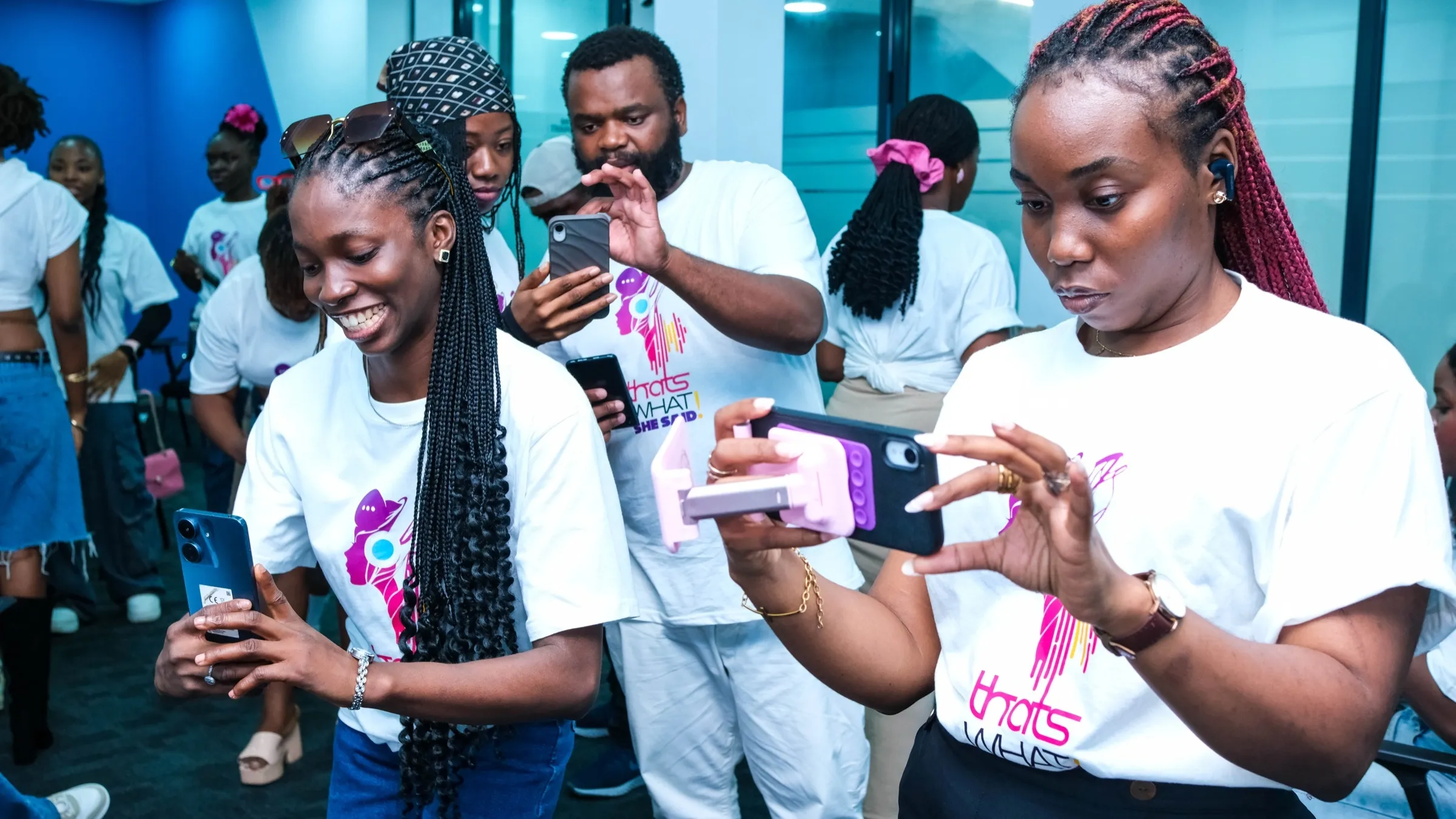 Filming on a phone at a TWSS session in Lagos