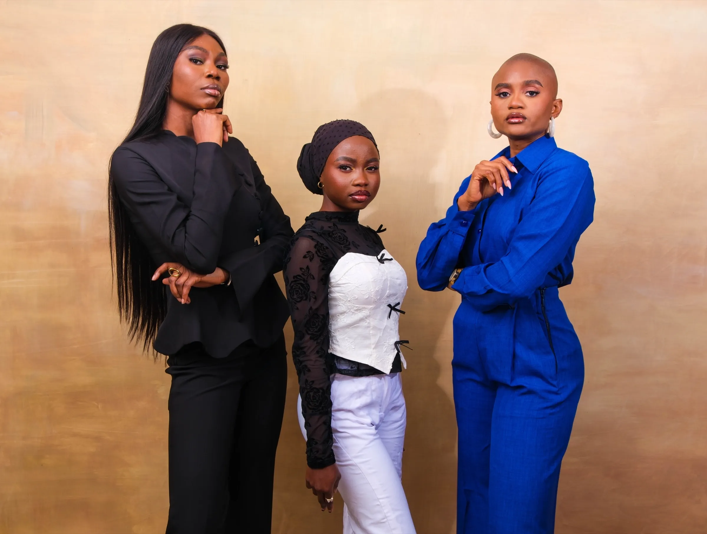 Three podcast guests posing before recording in Lagos