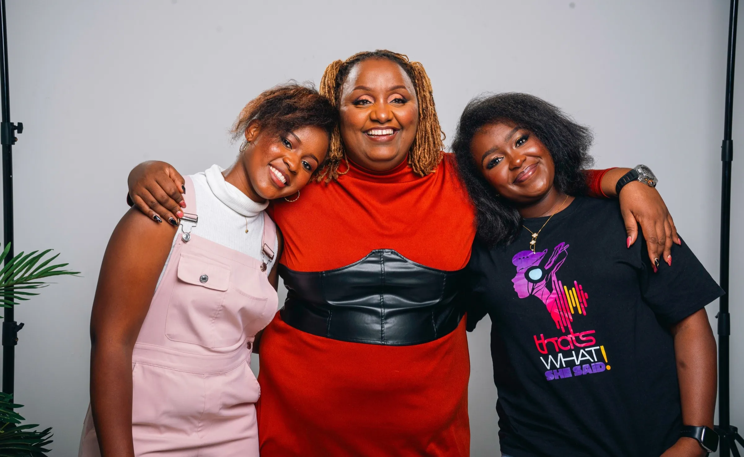 Three TWSS women hugging in Nairobi
