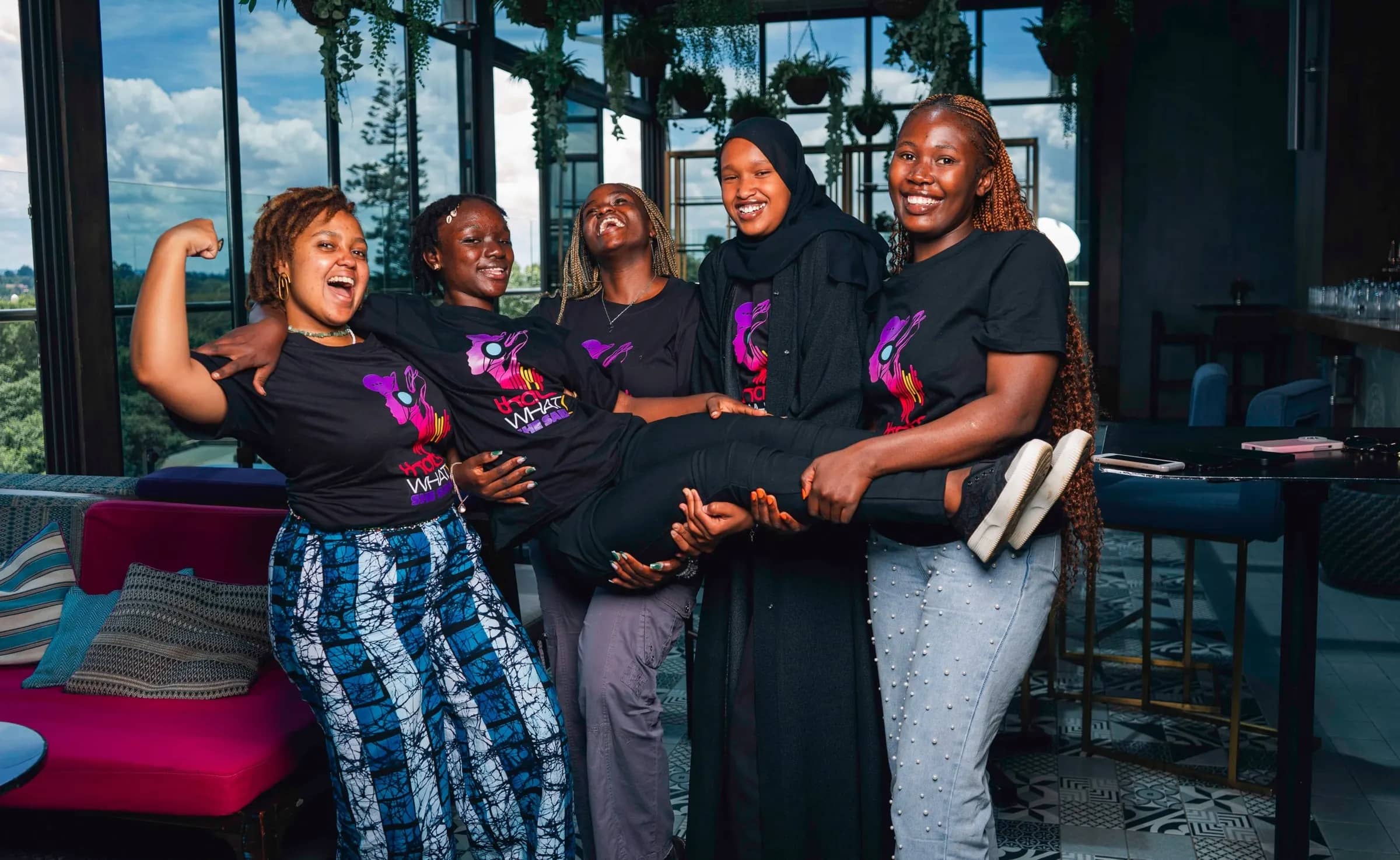 TWSS members lifting a friend in Nairobi
